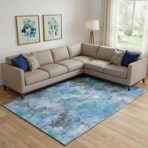 HomeRoots 9' X 12' Floral Washable Area Rug in Blue Gray & Ivory – UV Protected, Stain Resistant, Durable Design 706054