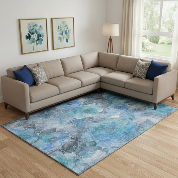 HomeRoots 9' X 12' Floral Washable Area Rug in Blue Gray & Ivory – UV Protected, Stain Resistant, Durable Design 706054