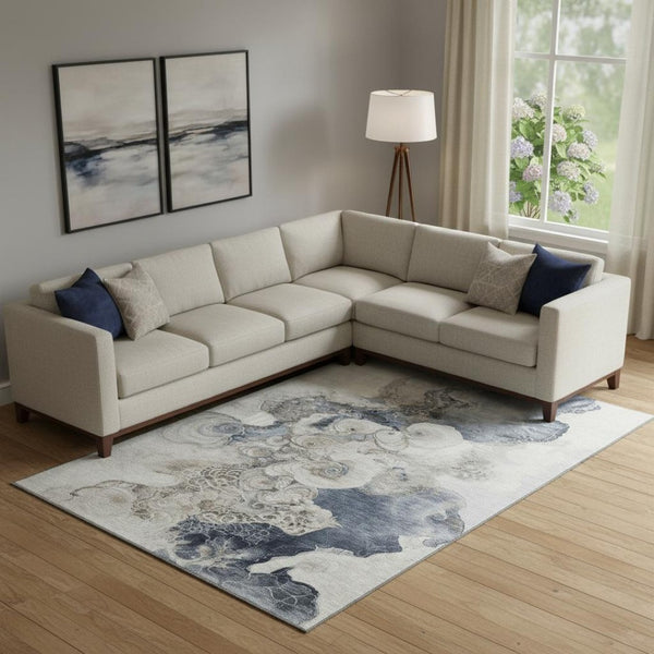 HomeRoots 9' X 12' Stylish Ivory and Blue Abstract Area Rug – Washable, UV Protected, Perfect for High-Traffic Areas 706108