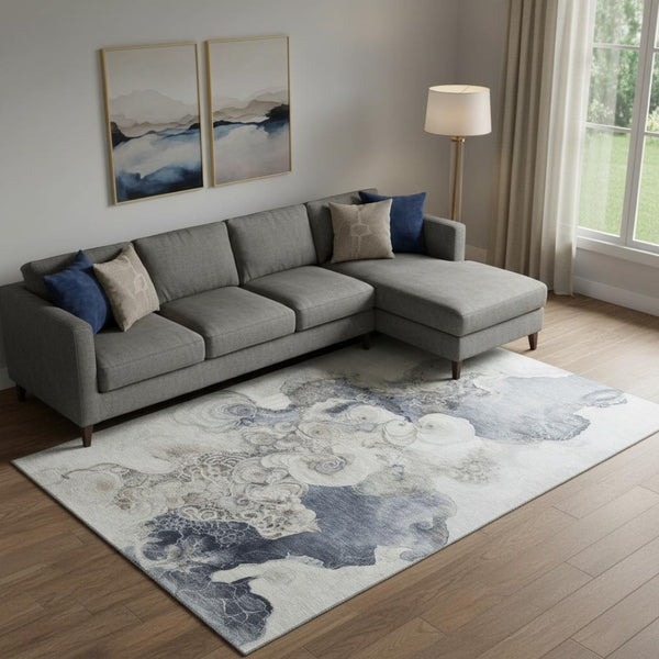 HomeRoots 10' X 14' Ivory and Blue Abstract Area Rug - Stylish, Washable, UV-Protected for High-Traffic Homes 706109