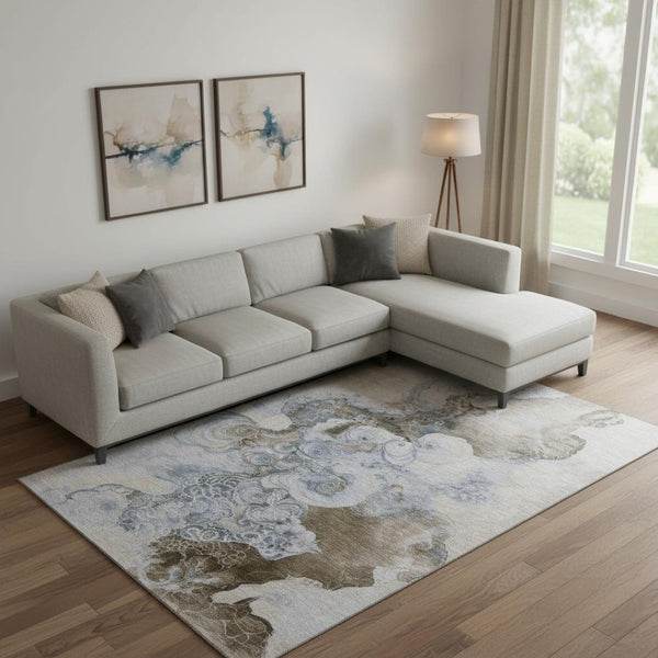 HomeRoots 9' X 12' Taupe Blue Ivory Abstract Area Rug - Washable, UV-Protected, Stylish for Indoor & Outdoor Use 706120