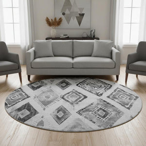 HomeRoots 8' Gray And Silver Geometric Round Rug - Stylish, Stain Resistant, UV Protected for Modern Spaces 706124