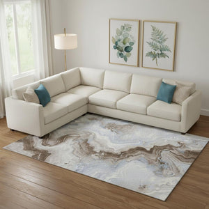 HomeRoots 9' X 12' Abstract Taupe Blue & Ivory Area Rug - Washable, UV Protected & Perfect for High-Traffic Rooms! 706156