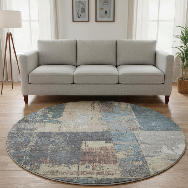 HomeRoots 8' Beige and Blue Abstract Round Rug - Stylish, Washable, UV-Protected for High-Traffic Areas 706232