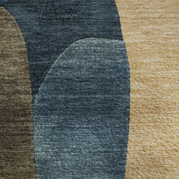 HomeRoots 10' X 14' Abstract Area Rug in Navy, Orange & Rust - Washable, UV Protected, Non-Slip for Durability 706271