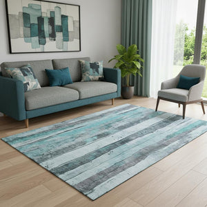 HomeRoots 5' X 8' Striped Teal and Gray Washable Area Rug with UV Protection for Family-Friendly Spaces 706483
