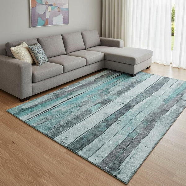 HomeRoots 8' X 10' Stylish Teal & Gray Striped Washable Area Rug with UV Protection for Modern Spaces 706485