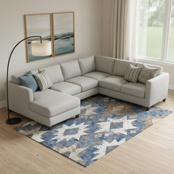 HomeRoots 10' X 14' Southwestern Area Rug in Blue, Brown & Ivory – Washable, UV Protected & Stain Resistant 706643