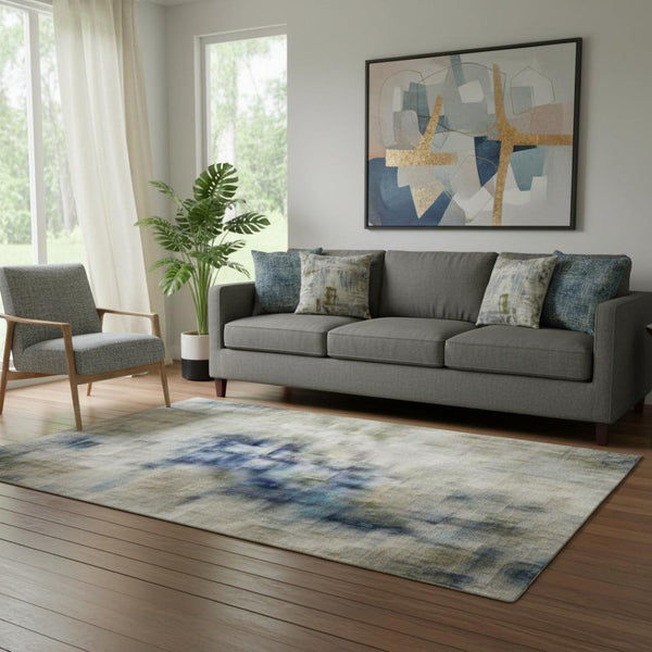 HomeRoots 8' Sky Blue Gray and Ivory Abstract Washable Round Rug with UV Protection for Modern Spaces 706694