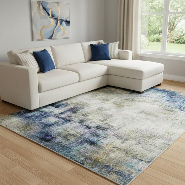 HomeRoots 9' X 12' Sky Blue Gray Ivory Abstract Area Rug - UV Protected, Washable & Perfect for High-Traffic Spaces 706696
