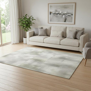 HomeRoots 8' Teal Gray and Ivory Abstract Washable Round Rug - Stylish, Durable, Stain-Resistant, UV Protected! 706700