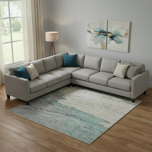 HomeRoots 10' X 14' Teal Gray and Ivory Abstract Area Rug - Durable, UV-Protected, Washable, and Stylish! 706703