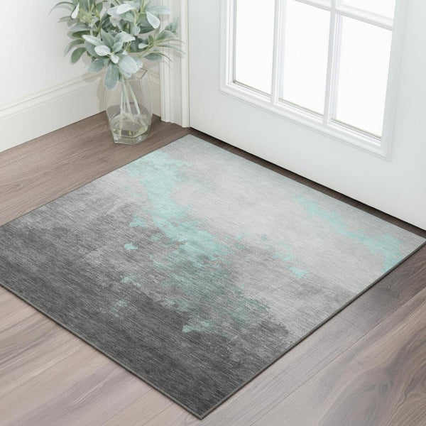 HomeRoots 5' X 8' Teal and Gray Abstract Area Rug - Washable, UV-Protected, Perfect for High-Traffic Homes! 706729