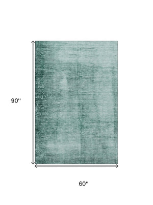 HomeRoots 8' Teal And Aqua Abstract Washable Round Rug – Durable, Stain-Resistant, UV-Protected for Modern Spaces 706888