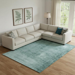 HomeRoots 10' Teal and Aqua Abstract Area Rug - Washable, UV Protected, Stain Resistant for High-Traffic Spaces 706891