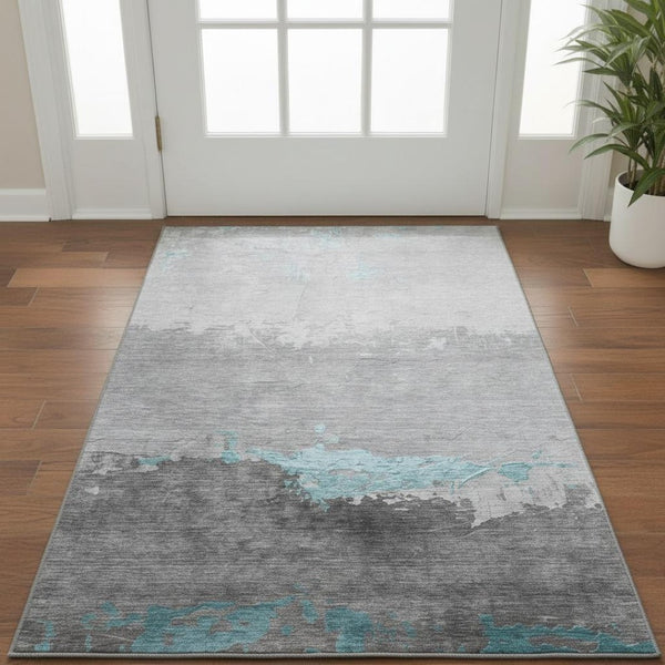 HomeRoots 5' X 8' Teal & Gray Abstract Area Rug - Washable, UV Protected, Stain-Resistant for High-Traffic Use 706917