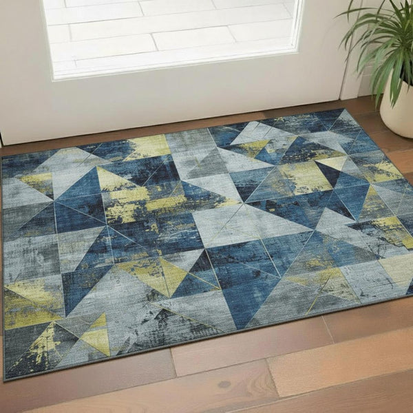 HomeRoots 5' x 8' Navy Blue and Gold Geometric Area Rug - Washable, UV-Protected, Stylish for Every Home! 706983