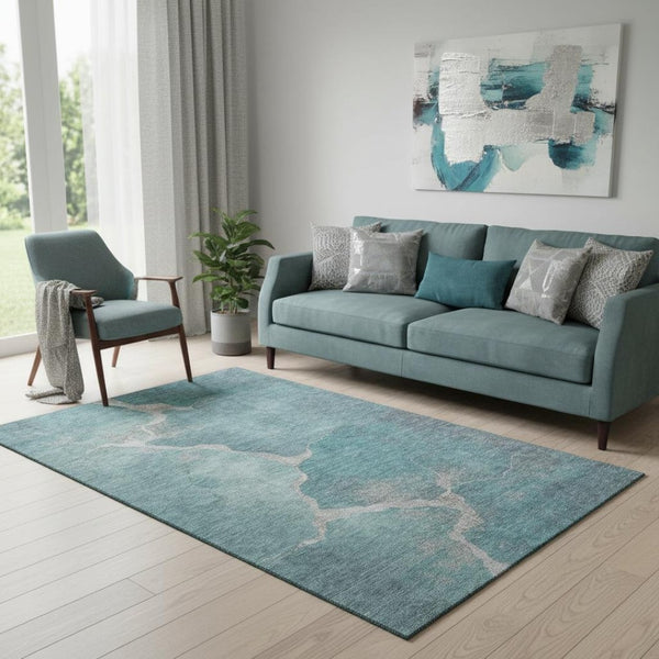 HomeRoots 8' Teal and Beige Abstract Round Rug - Washable, UV-Protected, Stain-Resistant for Indoor & Outdoor Use 707038