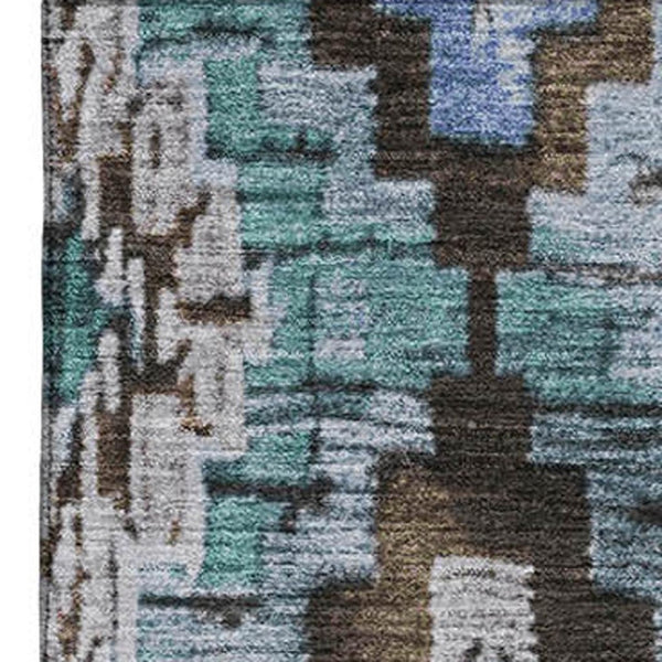 HomeRoots 9' X 12' Brown and Blue Ikat Area Rug - Washable, UV-Protected, Ideal for High-Traffic Spaces! 707106