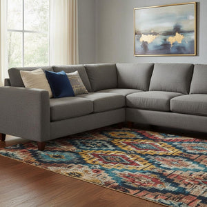 HomeRoots 9' X 12' Vibrant Rust, Blue & Coral Ikat Washable Area Rug with UV Protection for High-Traffic Spaces 707118