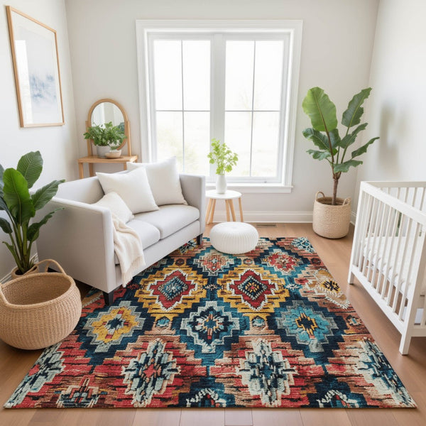 HomeRoots 9' X 12' Vibrant Rust, Blue & Coral Ikat Washable Area Rug with UV Protection for High-Traffic Spaces 707118