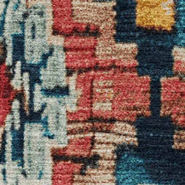 HomeRoots 10' X 14' Washable Rust, Blue, and Coral Ikat Area Rug with UV Protection for Stylish Living Spaces 707119