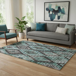HomeRoots 8' Teal Charcoal Ivory Ikat Washable Round Rug - Durable, UV-Protected, Perfect for High-Traffic Areas 707122