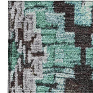 HomeRoots 8' Teal Charcoal Ivory Ikat Washable Round Rug - Durable, UV-Protected, Perfect for High-Traffic Areas 707122