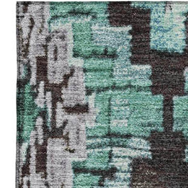 HomeRoots 8' Teal Charcoal Ivory Ikat Washable Round Rug - Durable, UV-Protected, Perfect for High-Traffic Areas 707122