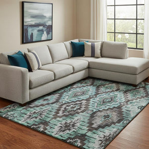 HomeRoots 9' X 12' Stylish Teal Charcoal Ivory Ikat Washable Area Rug with UV Protection for Easy Living 707124