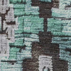 HomeRoots 9' X 12' Stylish Teal Charcoal Ivory Ikat Washable Area Rug with UV Protection for Easy Living 707124