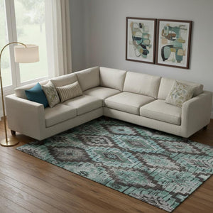 HomeRoots 10' Teal Charcoal Ivory Ikat Area Rug - Washable, UV-Protected, Stain-Resistant for Family Spaces 707125