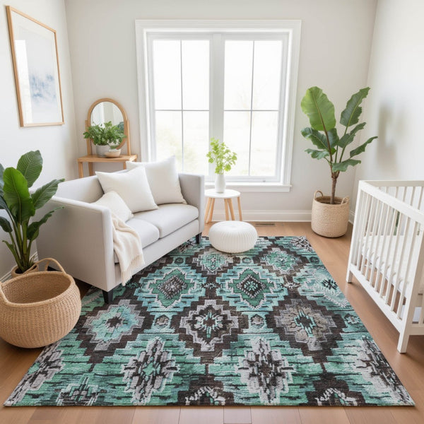 HomeRoots 10' Teal Charcoal Ivory Ikat Area Rug - Washable, UV-Protected, Stain-Resistant for Family Spaces 707125