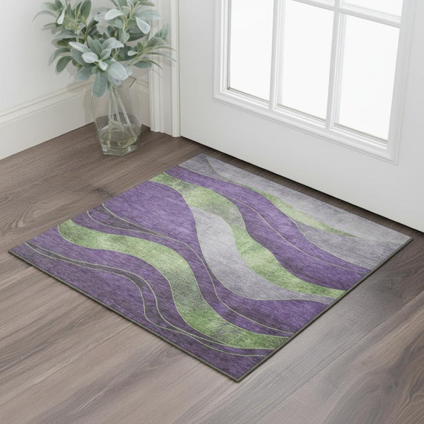 HomeRoots 5' X 8' Vibrant Purple and Green Abstract Washable Area Rug with UV Protection for Modern Spaces 707145