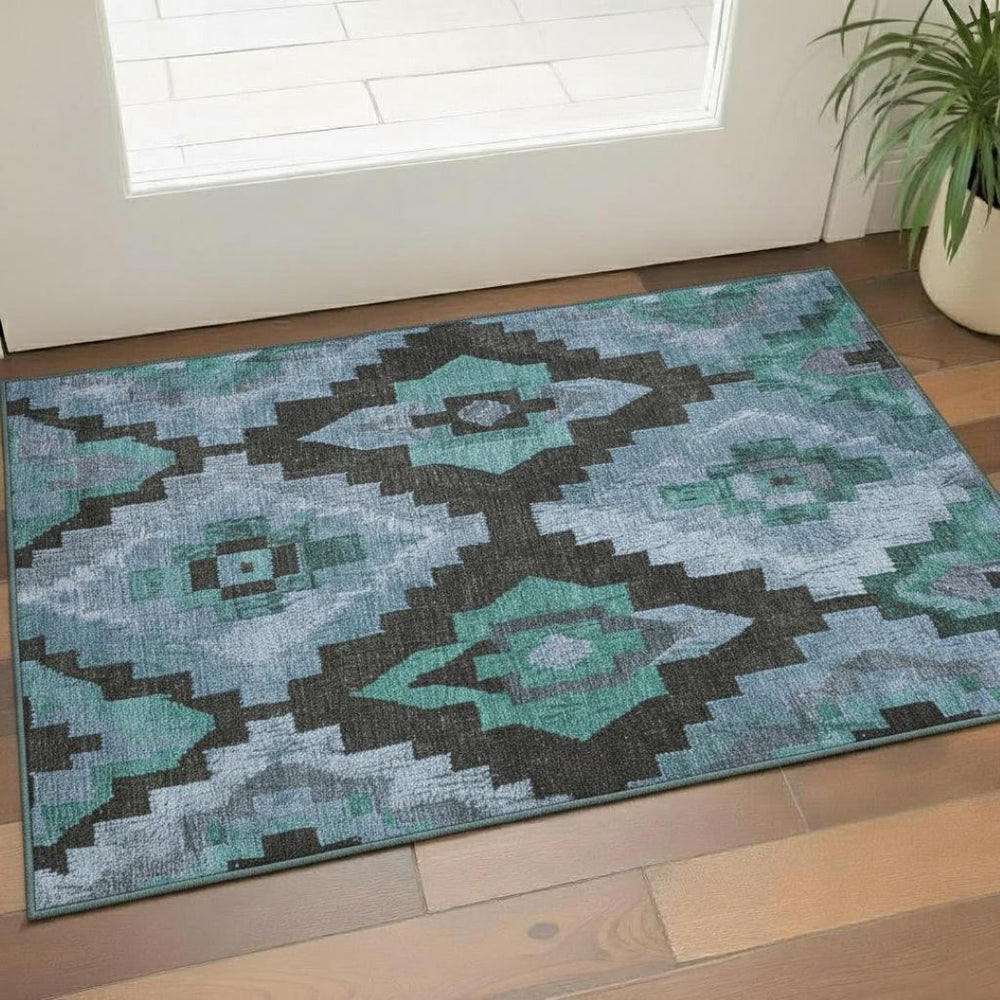 HomeRoots 5' X 8' Teal & Charcoal Ikat Area Rug – Stylish, Washable, UV-Protected for High-Traffic Spaces 707241