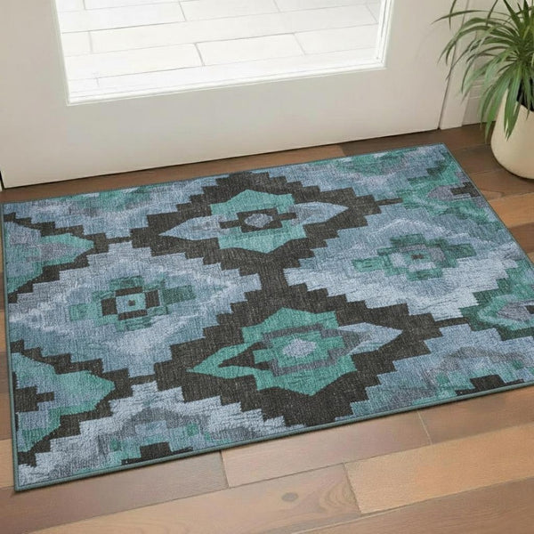 HomeRoots 5' X 8' Teal & Charcoal Ikat Area Rug – Stylish, Washable, UV-Protected for High-Traffic Spaces 707241