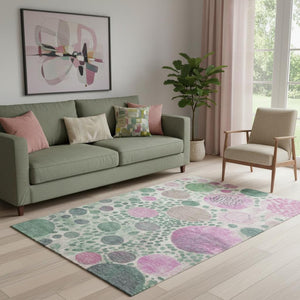 HomeRoots 8' Contemporary Geometric Round Rug in Green, Pink & Ivory - Washable, Durable & UV Protected! 707260
