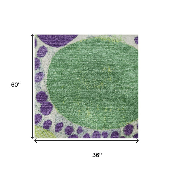 HomeRoots 5' X 8' Stylish Purple, Green & Ivory Geometric Area Rug - Washable, UV Protected & Non-Slip Backing 707277
