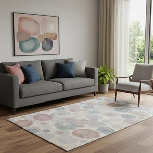 HomeRoots 8' Stylish Peach, Gray & Silver Geometric Round Rug - Washable, UV Protected & Stain Resistant Design 707320