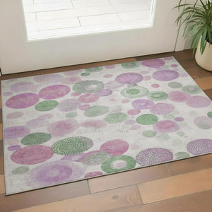 HomeRoots 5' X 8' Washable Pink Green Ivory Area Rug - Durable, UV-Protected, Modern Geometric Design for Any Room 707325