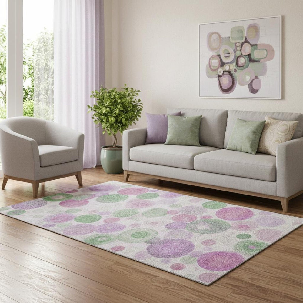 HomeRoots 8' Pink Green and Ivory Geometric Round Rug – Washable, UV-Protected, Durable, and Stylish Design 707326