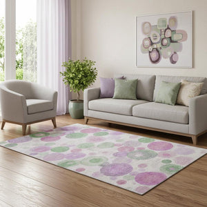 HomeRoots 8' Pink Green and Ivory Geometric Round Rug – Washable, UV-Protected, Durable, and Stylish Design 707326