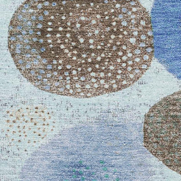 HomeRoots 8' Teal Brown and Blue Geometric Round Rug - Washable, UV Protected, Kid & Pet Friendly Accent Decor 707338