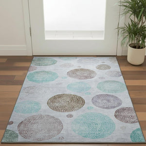 HomeRoots 5' X 8' Geometric Area Rug in Blue, Brown & Teal - Washable, UV Protected & Stain-Resistant Design 707367