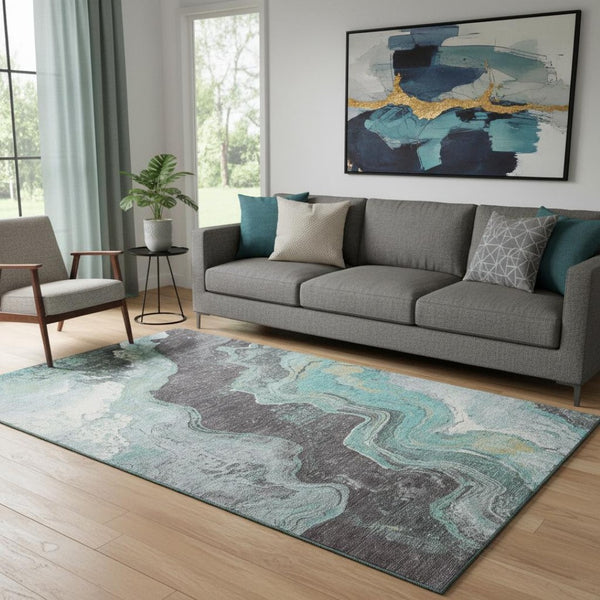 HomeRoots 8' Teal Gray and Ivory Abstract Washable Round Rug - Durable, Stain-Resistant, UV Protected Design 707722
