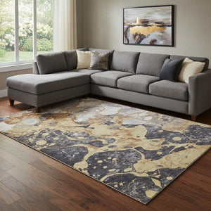 HomeRoots 9' X 12' Gold Gray Ivory Abstract Area Rug - Washable, UV Protected, Stain-Resistant, Durable Design 707772
