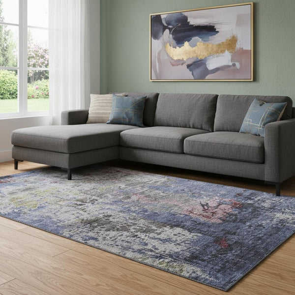 HomeRoots 9' X 12' Modern Abstract Area Rug in Blue, Pink & Ivory - Washable, UV-Protected, Non-Slip Design 707808