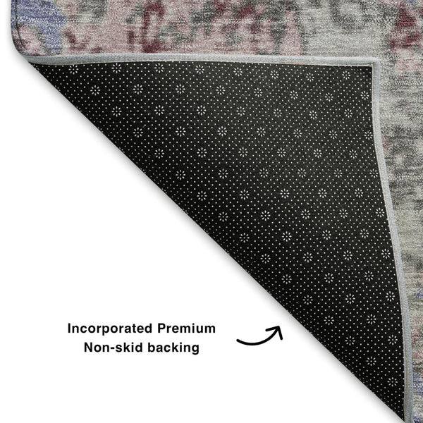 HomeRoots 9' X 12' Modern Abstract Area Rug in Blue, Pink & Ivory - Washable, UV-Protected, Non-Slip Design 707808