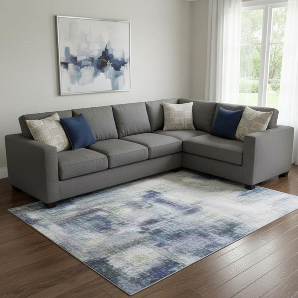 HomeRoots 9' X 12' Blue and Gray Abstract Area Rug – Washable, UV-Protected, Durable for High-Traffic Spaces 707844