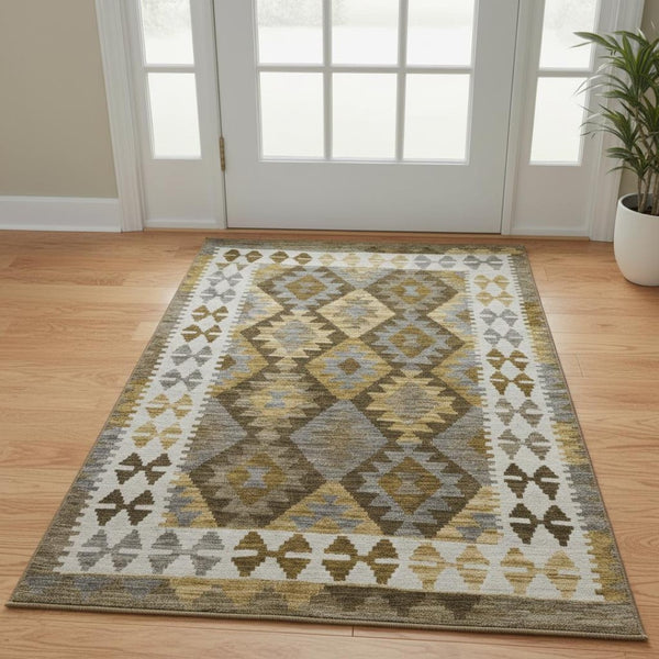 HomeRoots 5' X 8' Brown And Ivory Tribal Area Rug - Washable, UV Protected, Stain Resistant, Pet Friendly Design 707925